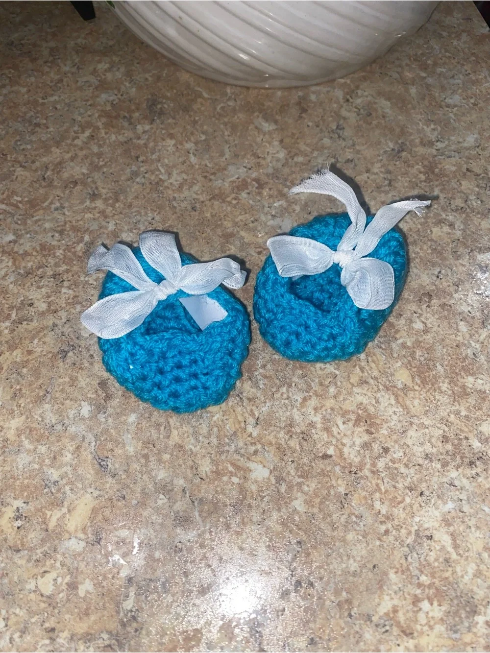 Crocheted Turquoise Baby Booties with a White Ribbon Bow Accent - Picture 2 of 4